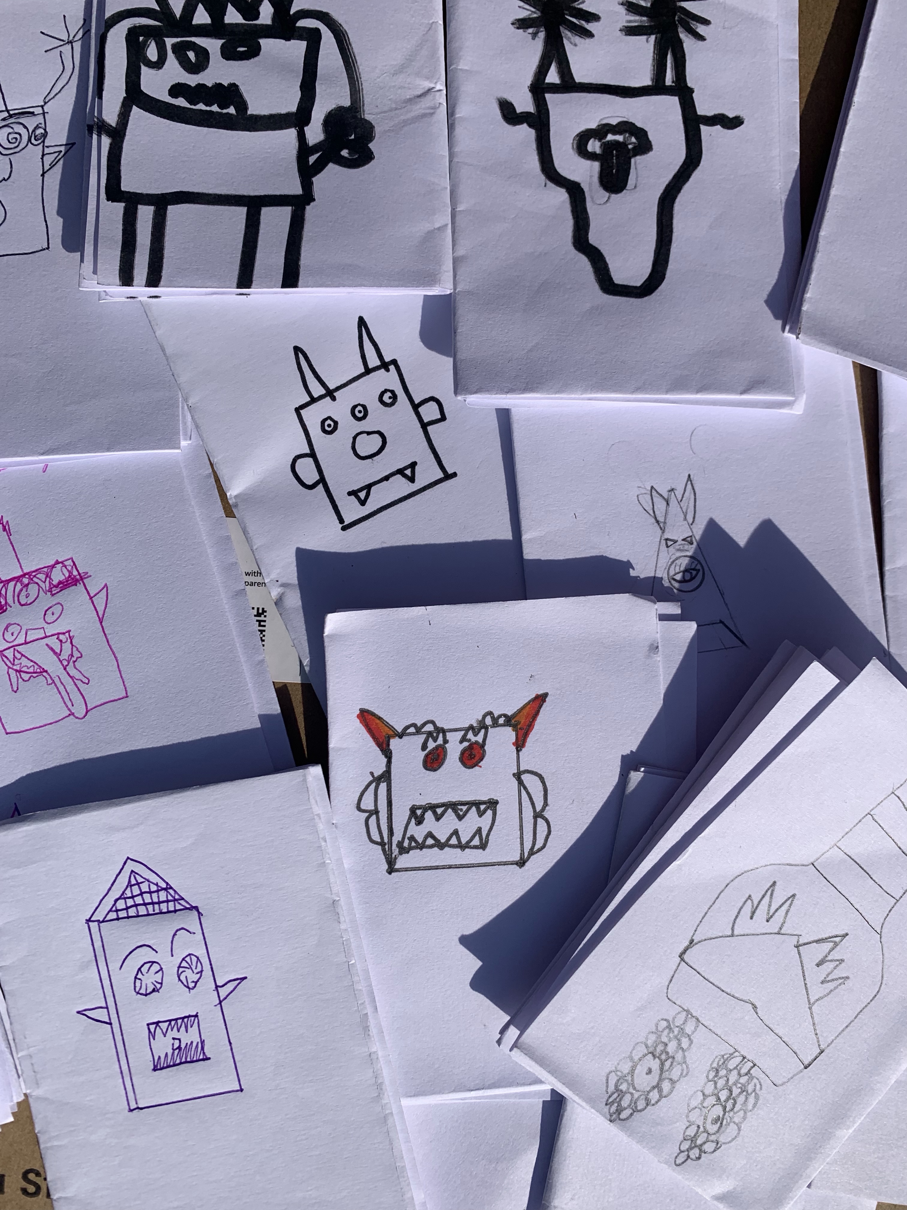 Children’s model designs on folded paper
